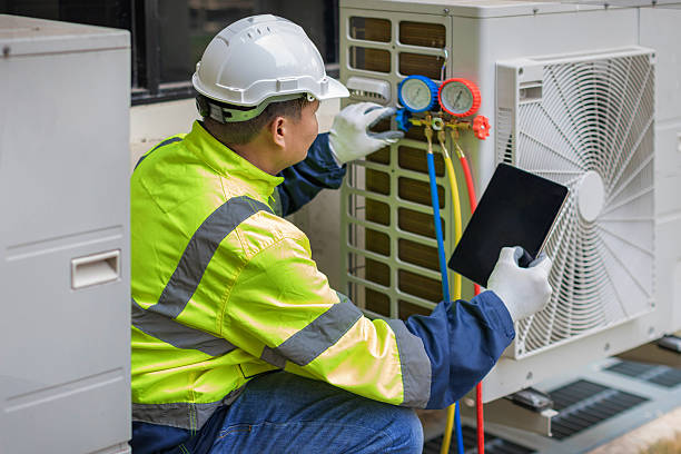 Professional Hvac Maintenance technician working in Tuxedo Park, NY